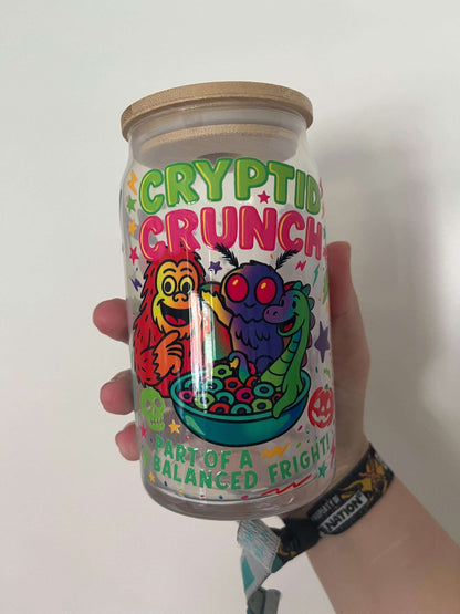 cyrptid themed glass tumbler featuring mothman big foot lochness monster