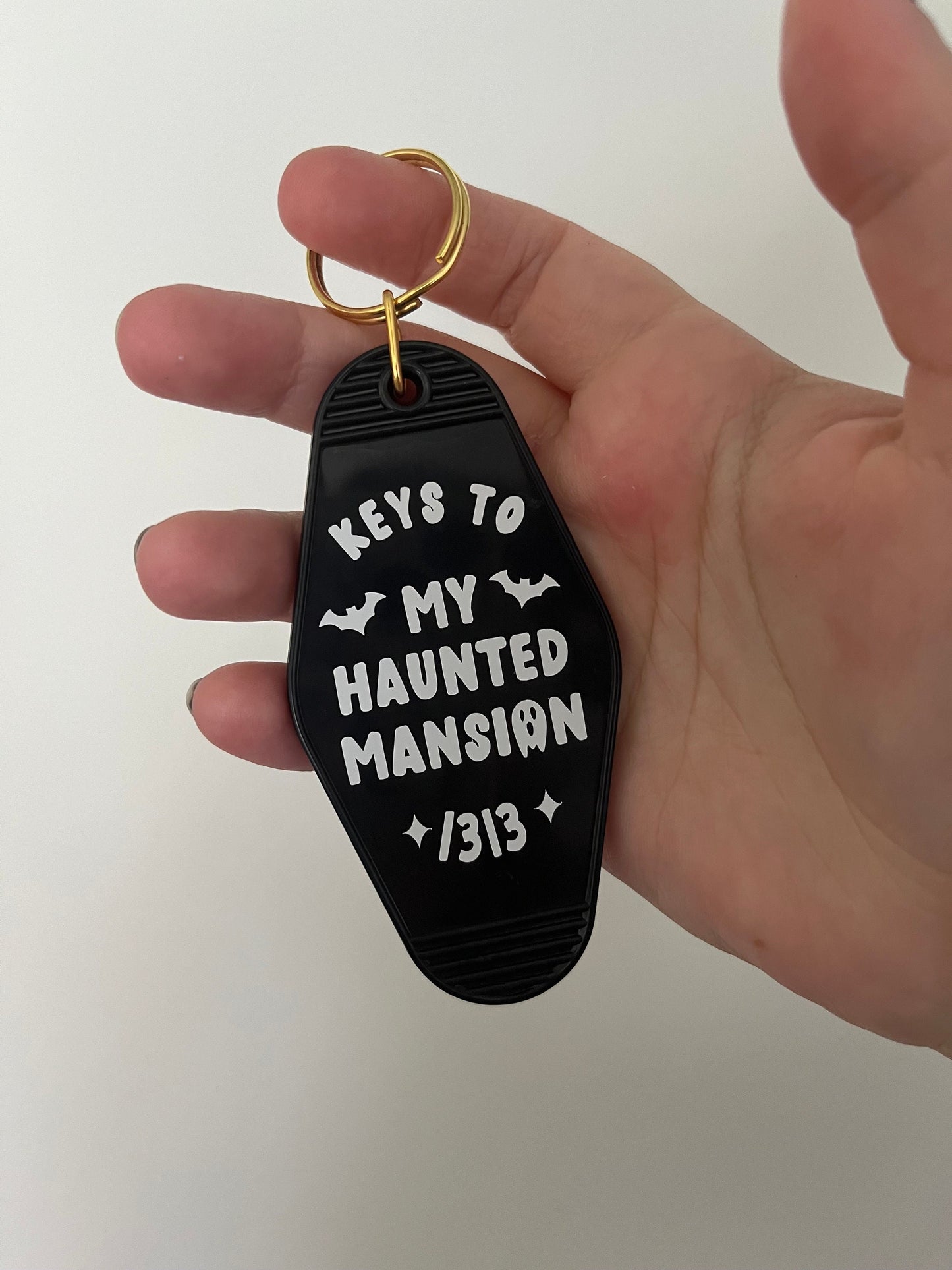 Keys to my haunted mansion motel keyring