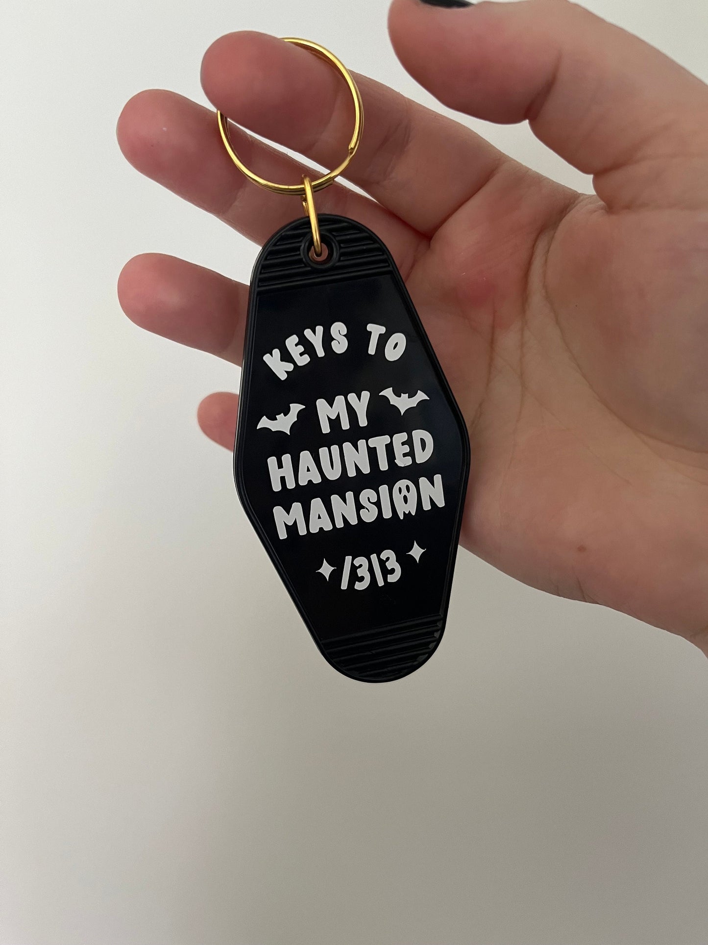 Keys to my haunted mansion motel keyring