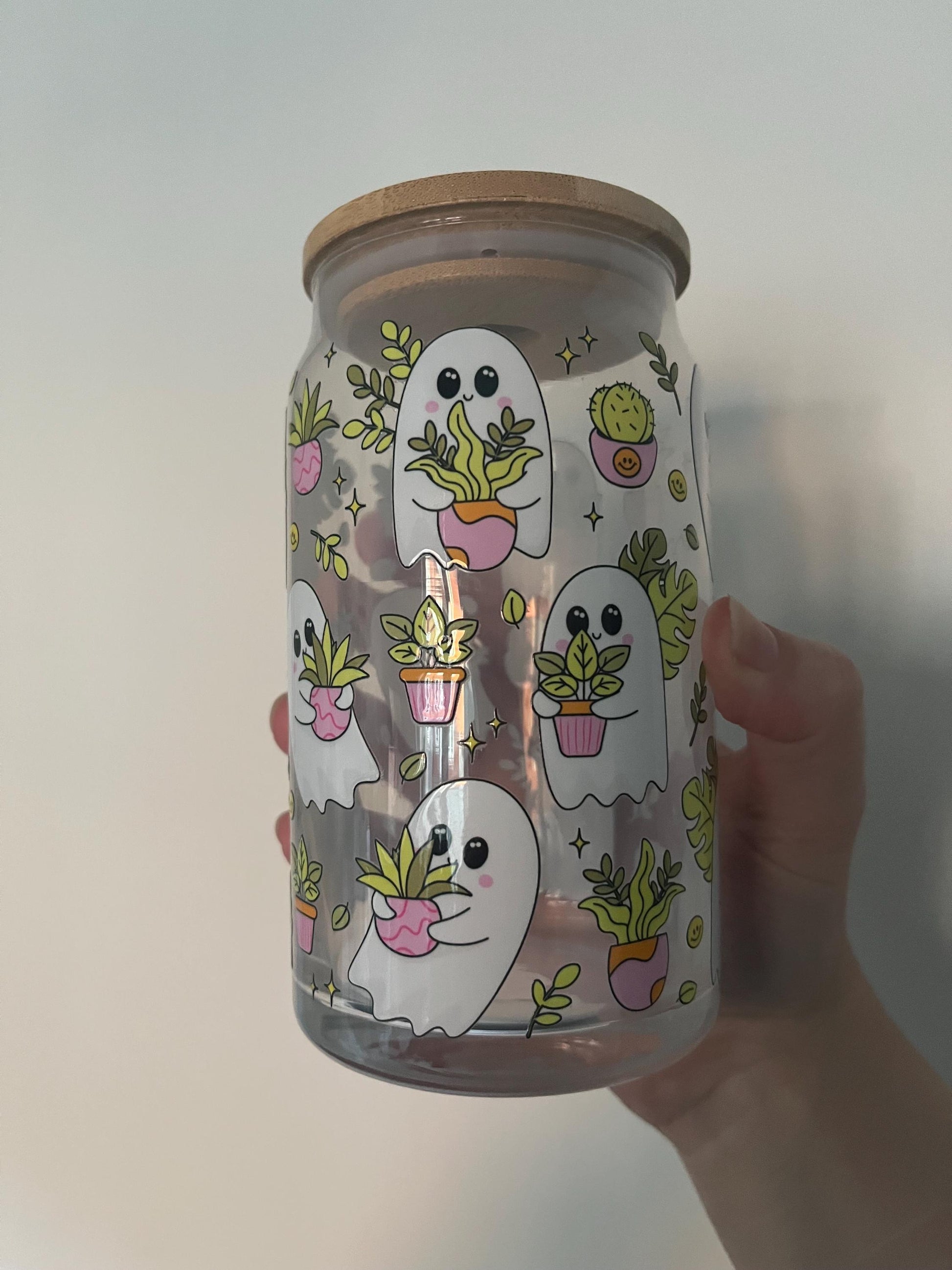 160z glass can with spooky sheet ghosts and plants
