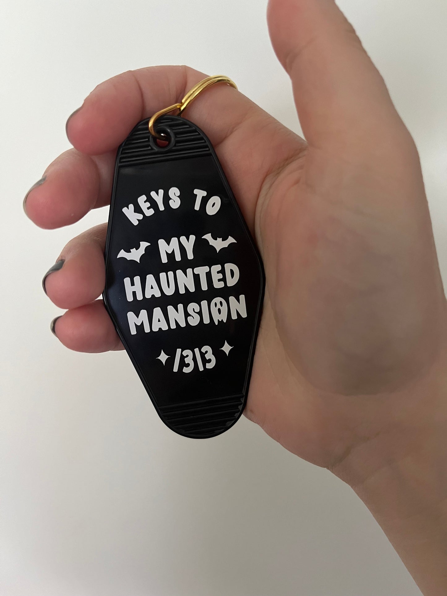 Keys to my haunted mansion motel keyring