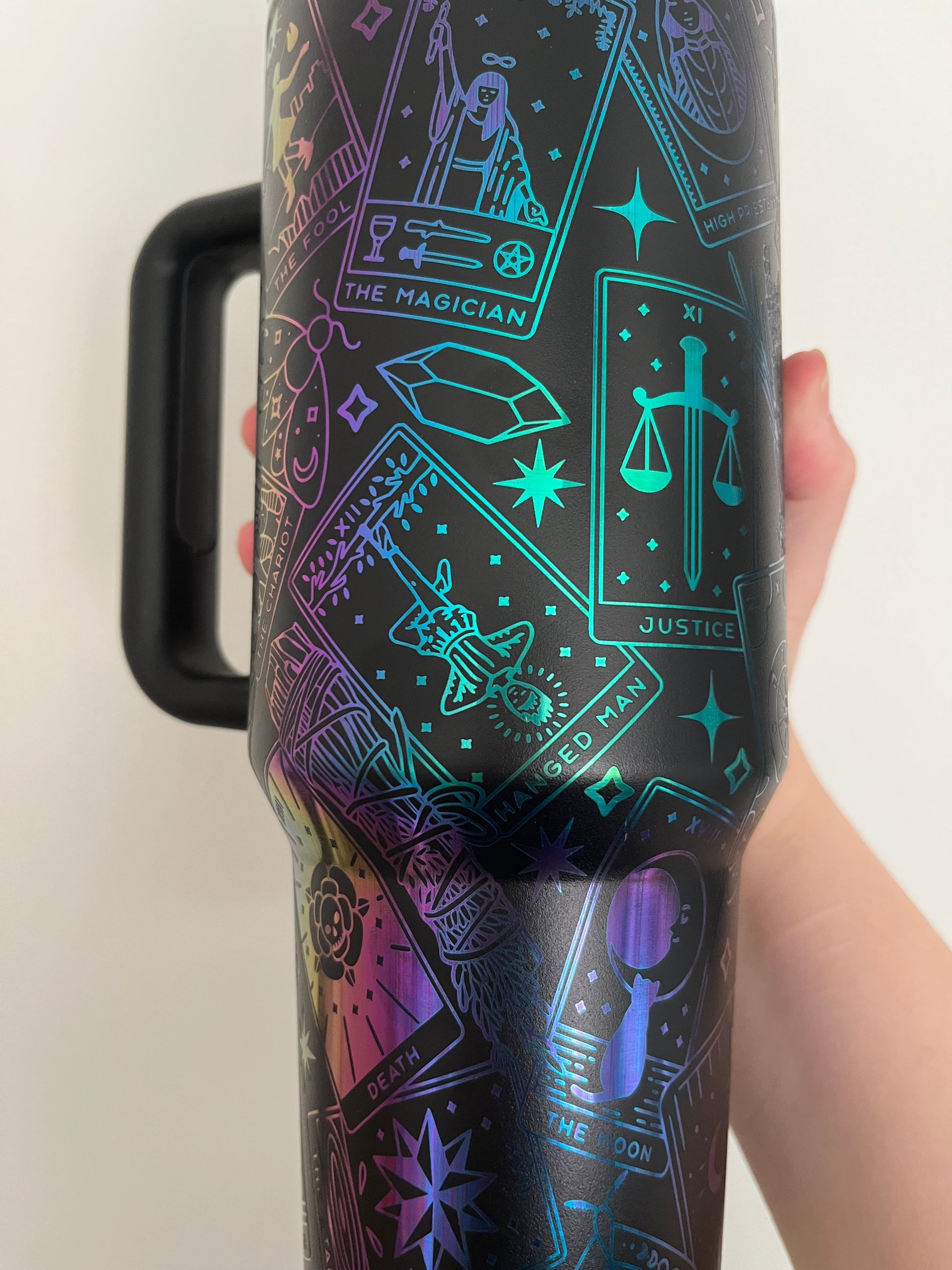 close-up of laser-engraved tarot design on tumbler