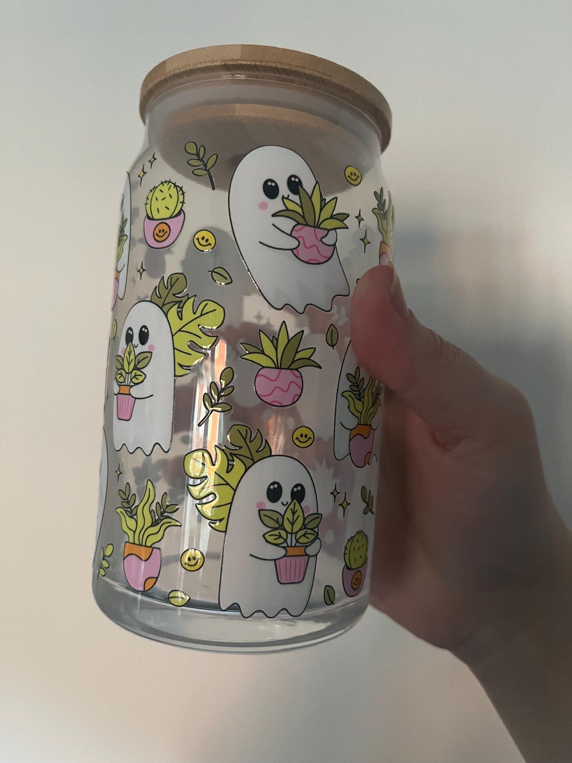160z glass can with spooky sheet ghosts and plants