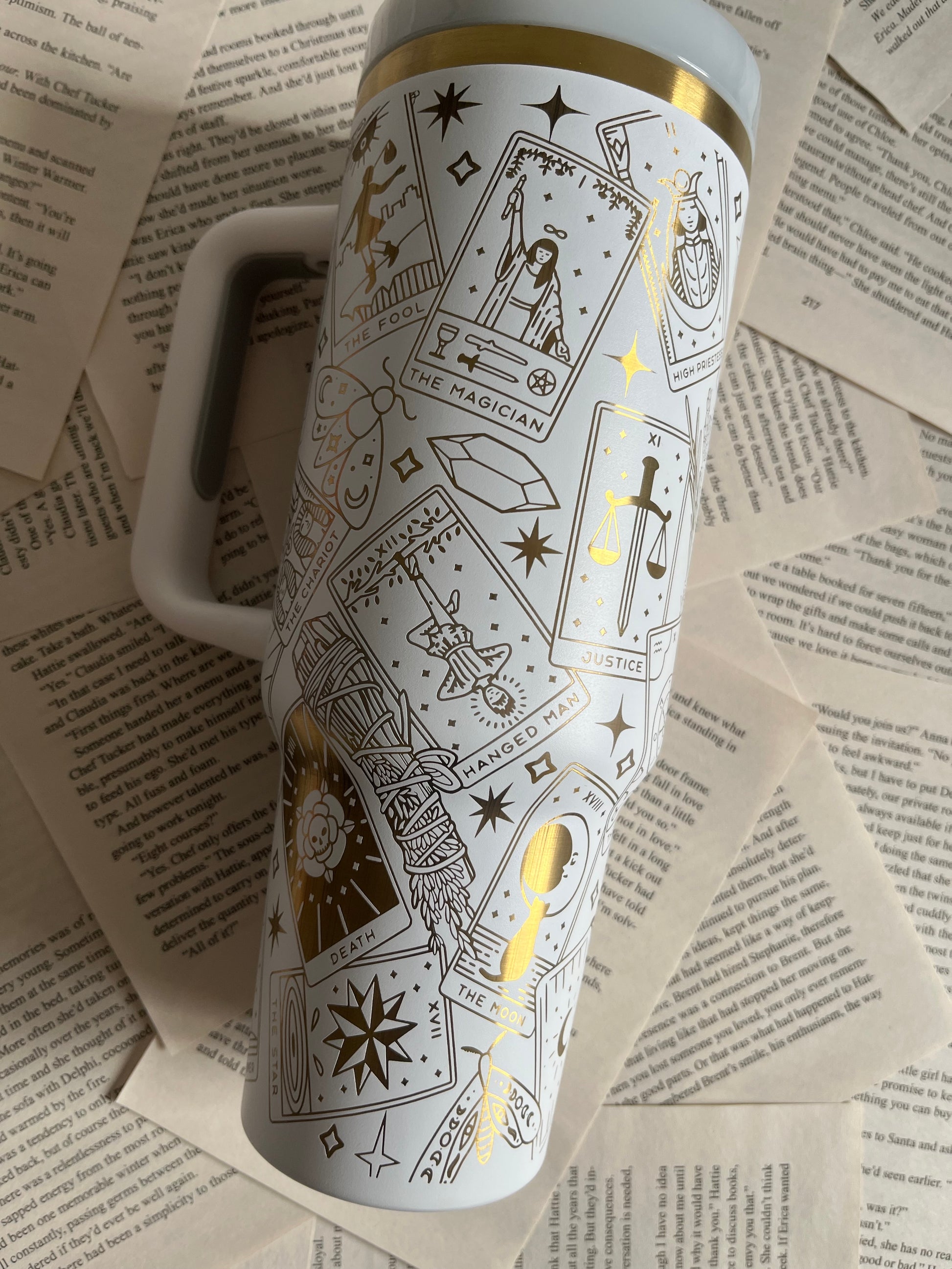 etched tarot symbols on stainless steel tumbler surface